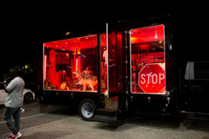 glass wall display truck ooh advertising